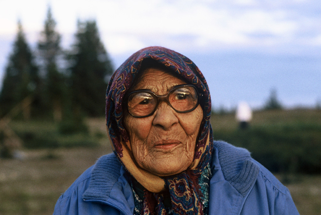 Cree Elder Woman in Whapmagoostui (1993) in the James and Hudson Bay regions of Northern Quebec, Canada. One of the people involved in the day-to-day struggle against the multinational Hydro-Quebec. The people were already impacted by the nearly completed La Grande (Phase 1) Project and also with the people fighting to stop Phase II, the Great Whale Project. Hydro-Quebec’s La Grande project dam that flooded thousands of hectares on Cree land, displacing all Cree in that area. An untimely water release from this dam drowned 10,000 migrating caribou. / Photo Credit: © PhotoLangelle.org