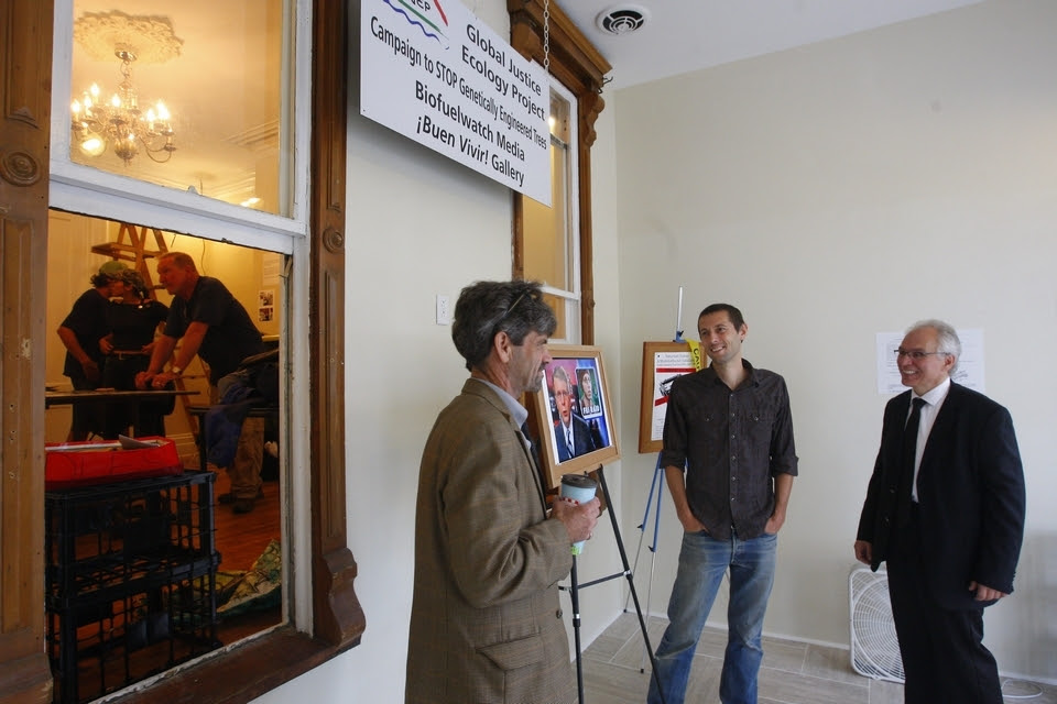 Leslie J. Pickering, center, talks with his attorneys Daire B. Irwin, left, and Michael Kuzma during the installation of his exhibit at the ¡Buen Vivir! Gallery in Buffalo on Tuesday. Photos by Mark Mulville/Buffalo News